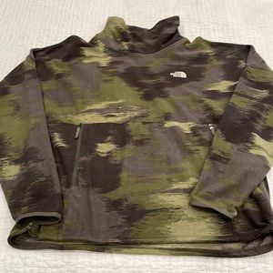 Gently used fleece North Face pull over with pockets.